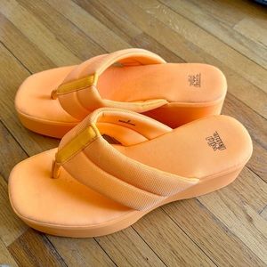 Bright orange platform sandals